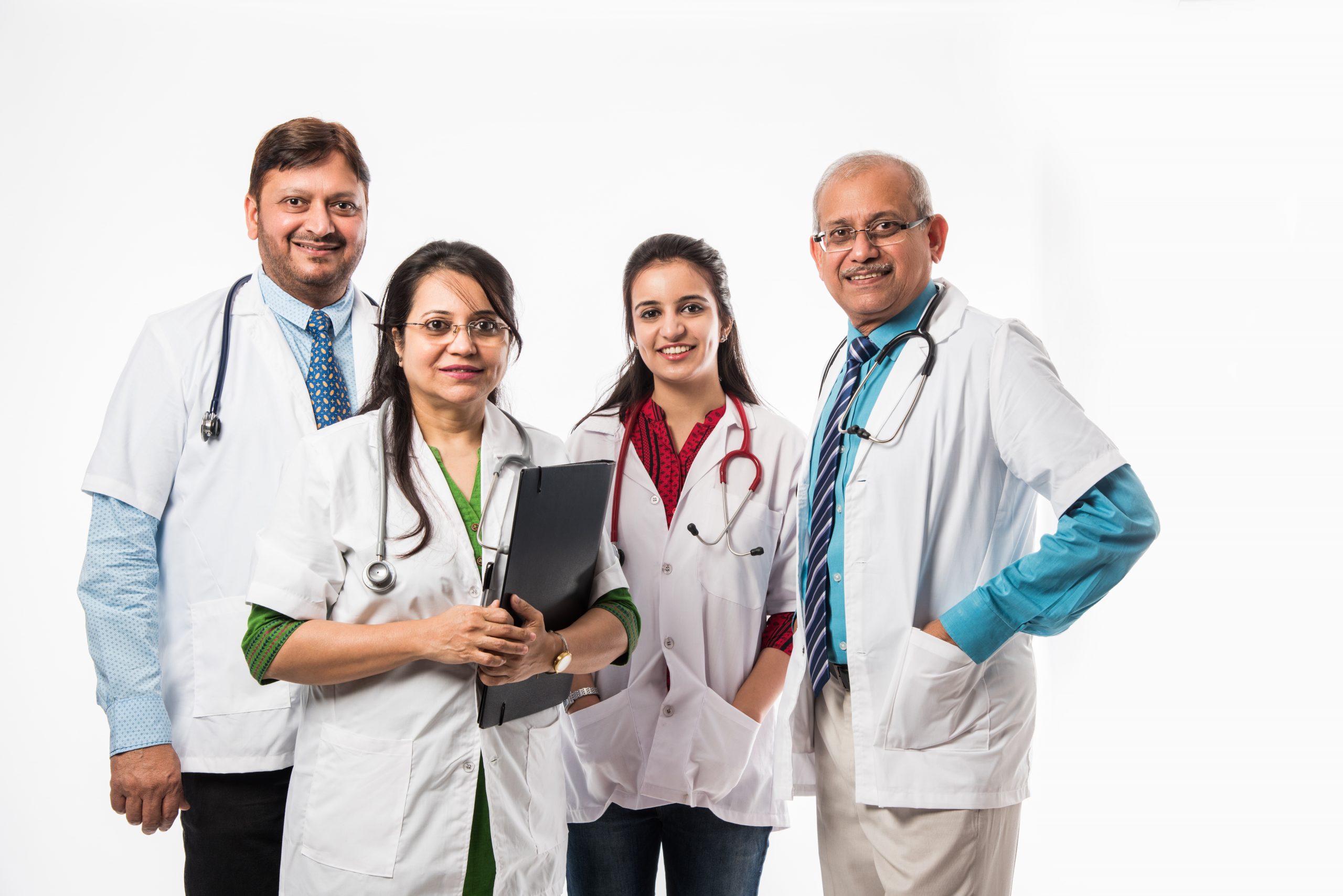 Group of Indian medical doctors, male and female standing isolated on white background